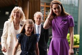 Britain&#039;s Catherine, Princess of Wales and Princess Charlotte during day fourteen of the 2024 Wimbledon Championships at the All England Lawn Tennis and Croquet Club, London, Britain, ahead of Kate presenting the trophy to the winner of the men&#039;s final. Picture date: Sunday, July 14, 2024. Aaron Chown/Pool via REUTERS