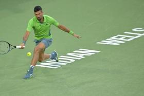 Mar 11, 2024; Indian Wells, CA, USA;  Novak Djokovic (SRB) hits a shot in his third round match against Luca Nardi (ITA) in the BNP Paribas Open at the Indian Wells Tennis Garden. Mandatory Credit: Jayne Kamin-Oncea-USA TODAY Sports