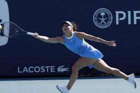 Simona Halep reaching for a forehand against Paula Badosa on day two of the Miami Open.