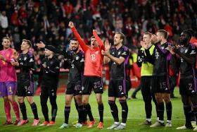 Soccer Football - Bundesliga - 1. FC Union Berlin v Bayern Munich - Stadion An der Alten Forsterei, Berlin, Germany - April 20, 2024 Bayern Munich&#039;s Thomas Mueller and Harry Kane celebrate after the match REUTERS/Annegret Hilse