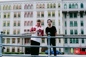 US band OneRepublic's new video features frontman Ryan Tedder and keyboardist Brian Willett at Singapore locations such as the Old Hill Street Police Station.