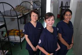 (From left) Ms Wee Chen Ping, Ms Eileen Ng and Ms Hema Devi Chandran, the three nurses in MOM's Assurance, Care and Engagement group.