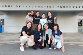 Nanyang Technological University computing student and IT security consultant Seraphina Chua (bottom row, second from right) with members of Ladies in Tech, an interest group at Nanyang Polytechnic.