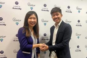 Violet Lim, co-founder and CEO of Lunch Actually, and Alex Tam, CEO of Paktor Group. The two dating agencies have merged to form Lunch Actually Paktor Group.