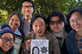 Jimmy O. Yang (middle) with participants at his own lookalike contest.