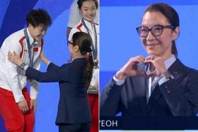 Michelle Yeoh presented the gold medal to China&#039;s Chen Yiwen after the women&#039;s 3m springboard diving final at the Paris 2024 Olympic Games on Aug 9. 