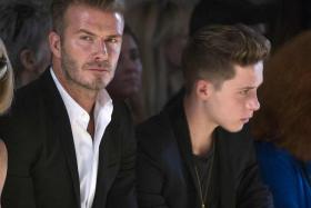 David Beckham and son Brooklyn escaped serious injury after they were involved in a car crash outside of Arsenal&#039;s training ground in Hertfordshire.