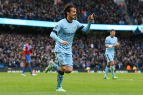 David Silva celebrates after scoring for Manchester City against Crystal Palace.