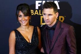 EYEING A MOVE? Lionel Messi, seen here with partner Antonella Roccuzzo at the Ballon d&#039;Or award ceremony, did not rule out leaving Barcelona when asked about his future.