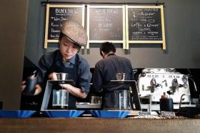 COFFEE CONNOISSEUR: Cafe owner Miss Tiffany Chan (above) imports and roasts the coffee beans herself to &#039;craft a specific flavour profile&#039;. 