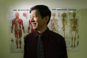 SAVING LIVES: Dr Patrick Goh has tended to five midair medical emergencies over the past 21 years. 
