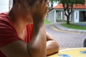 SCARRED: Cabby Ee Kah Ling is still mentally scarred after he was attacked by passenger, Dino Petrus Johannes Van Deijzen. Mr Ee’s spectacles (on table) were broken in the attack.