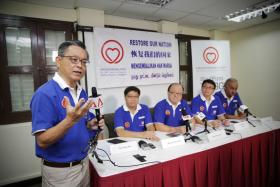 Mr Tan Jee Say (foreground) of the Singaporeans First party with new candidates (from left) Tan Peng Ann (hidden), Wong Soon Hong, Ang Yong Guan, Foo Ming Jin David and Sukdeu Singh. 