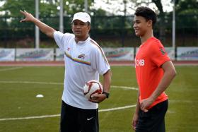 Ikhsan Fandi (right), son of Singapore football icon Fandi Ahmad (left), is based in Chile with Universidad Catolica.