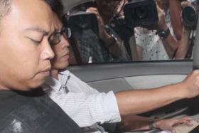 Kovan double murder suspect, Iskandar Rahmat, seen here after his arrest in 2013