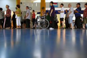 Voters queueing at a polling centre to cast their ballots during the general election.