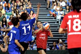 Actress Rebecca Lim (above) looking to score a shot for her team.