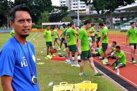 HOPEFUL: Geylang coach Hasrin (left) is hoping his charges will find the net more often.