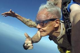 Mr Tan Kok Sing during his fourth skydive. He entered into the Singapore Book of Records as the oldest  skydiver here. 