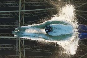 Michael Phelps makes a splash during the men&#039;s 200m butterfly event at the Rio Olympics.