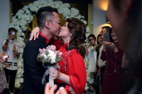 Singapore Idol 3 winner Sezairi Sezali and wife Syaza Qistina Tan at their wedding reception on Aug 21 at the SAF Yacht Club in Tanah Merah. 