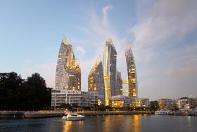 Reflections At Keppel Bay condominium on the southern coast of Singapore, with Marina on the right.