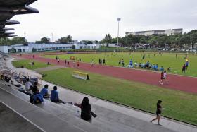 Fans watching the National Football League (NFL) Division 2 top-of-the-table clash between Admiralty and Sporting Westlake at Serangoon Stadium on 26 May 2012. 