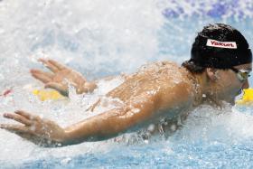 Singapore swimmer Joseph Schooling, en route to winning his 100m fly semi-finals in 50.78sec at the Fina World Championships in Budapest, Hungary.