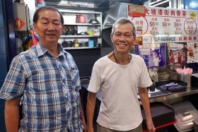 Hawkers provide needy elderly with free lunches