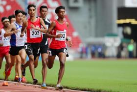 Under-18 400m record-holder Thiruben Thana Rajan (far right) trains six times a week. 