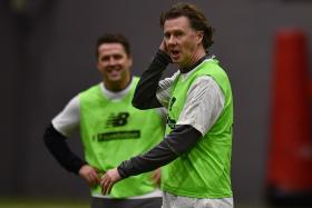 Former Liverpool players Steve McManaman with Michael Owen (background) in preparation for the Liverpool legends&#039; match against the AC Milan legends at Anfield in March.