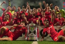 The Singapore Under-22s celebrating their Merlion Cup victory.