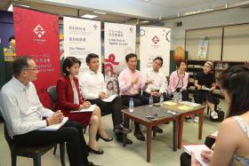 Education Minister Ong Ye Kung speaking to reporters on the sidelines of CDAC&#039;s annual general meeting yesterday. With him were (from left) CDAC executive director Pok Cheng Chong; Senior Parliamentary Secretary for Home Affairs and National Development Sun Xueling; Senior Parliamentary Secretary for Transport, and Culture, Community and Youth Baey Yam Keng; Marsiling-Yew Tee GRC MP Alex Yam; Senior Parliamentary Secretary for Education and Manpower Low Yen Ling; and Ms Lim Sau Hoong, who sits on CDAC&#039;s executive committee. 