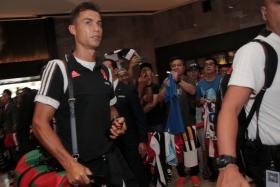 Cristiano Ronaldo arriving at Swissotel The Stamford on Saturday.