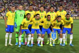 Brazil posing for a photo during their last friendly match, a 1-0 loss to Peru last week.