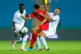 Singapore&#039;s Ikhsan Fandi trying to get the better of his marker.