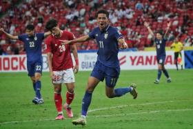 Thailand’s Bordin Phala (second from right) celebrates after scoring in the AFF Suzuki Cup final at the National Stadium on Dec 29, 2021.