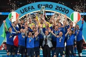 Champions Italy celebrating with the Euro 2020 trophy on July 11, 2021. 
