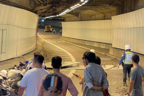 Heavy metal plates fell from a lorry at the Nicoll Highway entrance to the KPE, on Oct 24, 2022. 