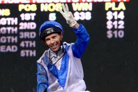 A jubilant Ronnie Stewart flashing three fingers to celebrate his third Singapore Gold Cup success aboard El Dorado in November 2011. The Australian is aiming for a fourth hurrah atop Cyclone on Saturday. 