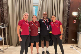 M. Ganesan with (from left) assistant Neuza Back, referee Stephanie Frappart and assistant Karen Diaz. 