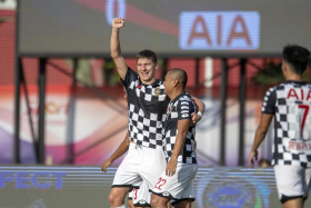 Brunei DPMM&#039;s Ukrainian striker Andrei Varankou celebrates after scoring in his team&#039;s 7-1 win over Balestier Khalsa, in their Singapore Premier League match in April 2019. 
