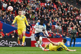 England's midfielder Bukayo Saka scores his team's second goal in London, on March 26, 2023. PHOTO: AFP
