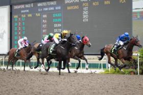 The Stephen Gray-trained Prioritize (Wong Chin Chuen) finishing the best to take a Class 4 race over 1,700m on March 18. ST PHOTO: SYAMIL SAPARI