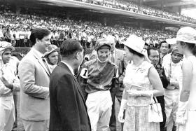 Queen Elizabeth II sharing a happy moment with trainer Ivan Allan (second from far left) and jockey Lester Piggott after they won the race named after the British monarch with Jumbo Jet on Feb 20, 1972. Looking on is Princess Anne (near left).  ST FILE PHOTO