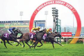 Sun Marshal staving off stablemate Mr Clint (No. 4) in the $1 million Group 1 Singapore Derby on July 21, 2019. PHOTO: STC

