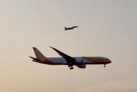 One of two RSAF fighter jets escorting Scoot flight TR16 back to Changi Airport on Thursday. PHOTO: MILITARY AVIATION PHOTOGRAPHY SINGAPORE/FACEBOOK
