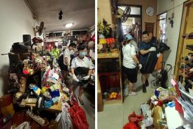 Volunteers clearing the flat.