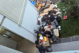 Passers-by were seen rummaging through items a Pasir Ris homeowner had packed neatly into boxes.