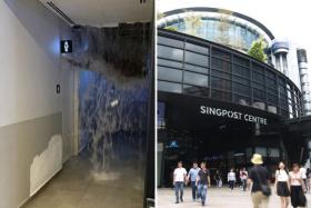 A girl was trapped inside a toilet after a burst pipe released a 'waterfall' at SingPost Centre. 